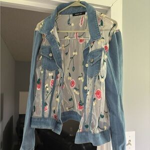 Floral denim jacket. Material of denim is stretchy and soft